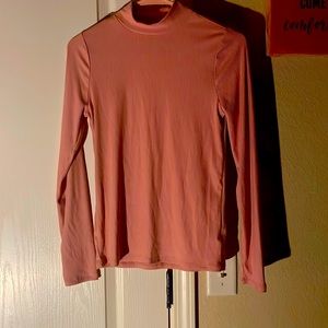 Pink turtleneck